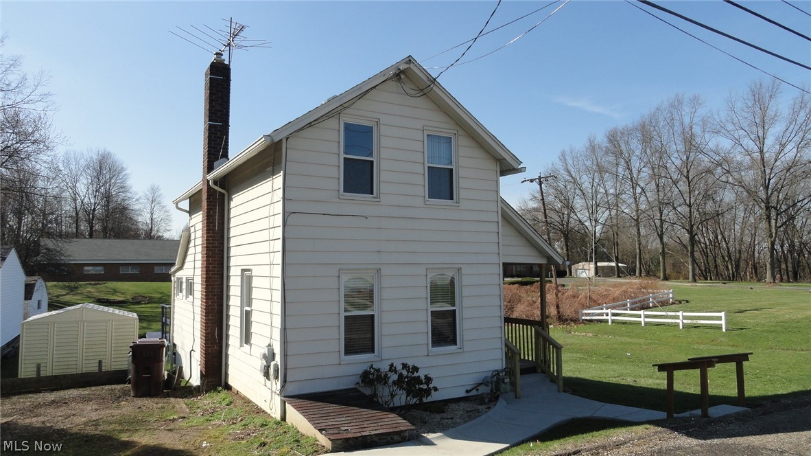 Move in ready, well maintained, cozy home situated on a sunny .35 acre lot with your own creek running through it. Many updates include newer concrete walk, updated front porch, newer exterior doors, vinyl replacement windows, newer septic system, updated electrical, newer laminate flooring and carpet, updated kitchen and bath, and newer hot water heater.