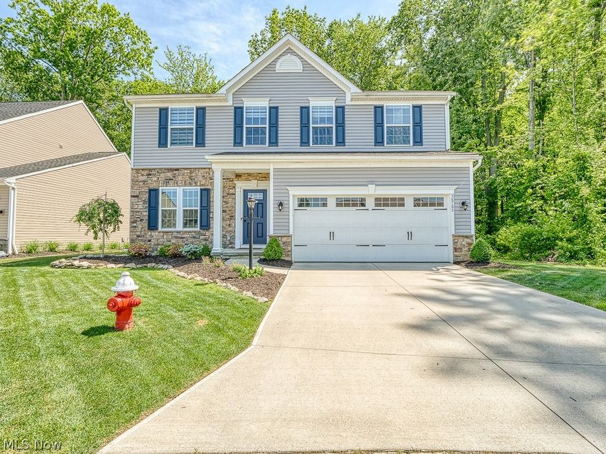 This Move-in-ready spacious colonial sits on a cul de sac and is one of the most private lots in the development! This newly built " Milan " style home welcomes you with a bright foyer and views through the double glass french doors into the private office/study. Follow in and enjoy a large family dining area with new paint and luxury vinyl flooring! Love an open concept?  It doesn't get any better then this.. enjoy cooking or entertaining in the large updated kitchen while over looking the cozy living space with a gas fireplace and custom tile surround. The kitchen features granite counters, stainless steel appliances, upgraded slow close cabinets, subway tile back splash, and an island that most people dream of! The morning room features a custom built in window seat, perfect for your morning coffee, while over looking the wooded and private back yard. The second level features a full updated bath with double vanity, *second floor laundry*, and a loft that is a perfect hangout area!