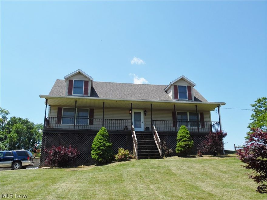 What  gorgeous views  from covered front porch & back deck overlooking 1.67 acres of beautiful grounds ! Home includes 3 bedrooms and 2.5 baths--1st floor Masterbed/bath and laundry room w/sink , new living room carpeting 6/17, all appliances are staying, 2 car garage. Lovely private setting only minutes from route 7.