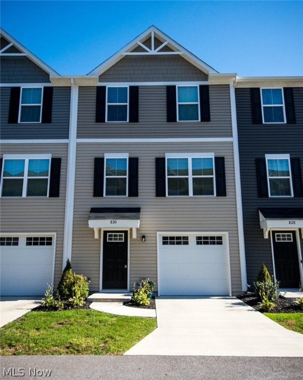 Don't miss your chance to own a piece of Riverwood Village, a lovely Ryan Homes townhouse community. This 3 bedroom 2 full bath townhome is just minutes from Rt. 2 and downtown Painesville, close to shops and restaurants. Three levels of living make this home quaint and functional. Your front door and attached garage lead you into the foyer where you have access to a large coat closet and a generous unfinished storage space. Moving on up to the main level you'll find your open concept kitchen and great room. The kitchen boasts stainless steel GE appliances and an island for food prep. Up to the 3rd level reveals 3 bedrooms, including the master with attached bath and walk-in closet. You'll enjoy using your newer washer and dryer on the same level, eliminating the need to drag your laundry up and down the stairs. The other two bedrooms and hall bathroom are perfectly sized for the rest of the family. The home also features sleek recessed lighting in all of the main living spaces. All th