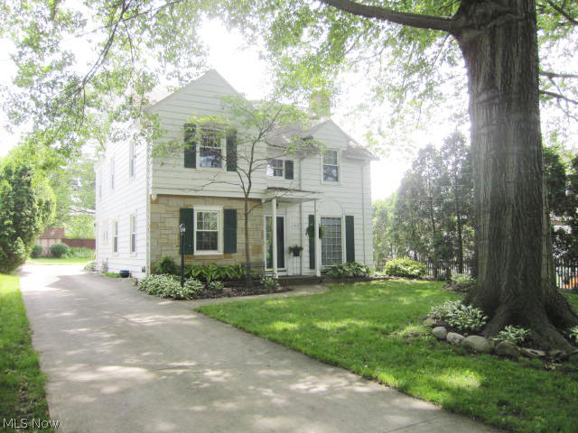 Absolutely beautiful and unique Center hall colonial off Chestnut Blvd. on one of Cuyahoga Falls widest and most attractive streets. This 4 Bedroom 2 full bath home features hardwood floors, huge living room with wood-burning fireplace. From living room, French doors lead to a light filled Sunroom that leads to a gorgeous and private large yard. This home has a 2 car attached garage, huge formal dining room and a large Butlers pantry between dining room and kitchen. Have a King size bed? No problem here! The Master Bedroom is large and has "his and her" closets. A Seller's favorite is the large recreation room plus lots of extra basement storage. Enjoy all the perks of living in the Falls including, utilities, amenities and parks.