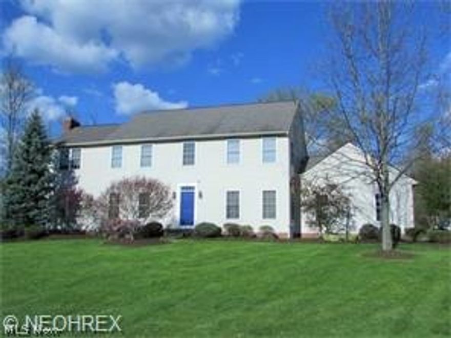 Nicely appointed 4 bedroom colonial in North Hudson. Large living room w/fireplace & wood floor; family size dining room; family room w/fireplace & french doors to living room; large kitchen w/eating area, granite counters, wood floor, white cabinetry; sunroom w/wood floor, vaulted ceiling & access to the patio. All bedrooms on second floor: huge master bedroom w/adjoining office/sitting room/craft room, large walk-in closet & bathroom w/double vanity, soaking tub & shower; spacious bedrooms w/generous closet storage. Finished basement offers the potential for an additional living suite w/private staircase to the garage, bedroom, media room, rec room and large finished storage room/closet. Wooded 1.67 acre lot. 3 car attached garage plus 2 car garage w/loft storage above attached to the main garage by a breezeway. Large flag stone patio for outdoor entertaining.