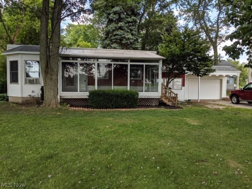 Perkins Schools! Over 1100 sq ft- 2 Bedroom Ranch *Over 1/2 Acre lot *Hardwood Floors in Both Bedrooms *New Furnace-2014 *New flooring in Kitchen *New Shower in 2017 *Full Basement *1.5 Car Garage *Screened in Porch for Entertaining *Country feel but close to town