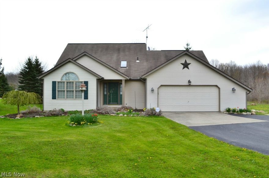 This 3 bedroom 2 1/2 bath home is truly move-in-ready!  Minutes from the freeway - Auburn, Burton, Chardon, Hiram and LaDue Resevoir. Very Well maintained home on 5 acres with 30x40 barn that has electric, water and phone. Great floor plan with a first floor master suite complete with updated bath including a jetted tub, shower, and heated tile floors.  Newer Windows and Pergo floor on the first level, newer carpeting on second floor with 2 bedrooms and a full bath.  Relax in the spacious great room with stone fireplace, well thought out kitchen and a formal dining room lead to the covered deck, perfect for outdoor entertaining with skylights and ceiling fan. Don't miss this great home!