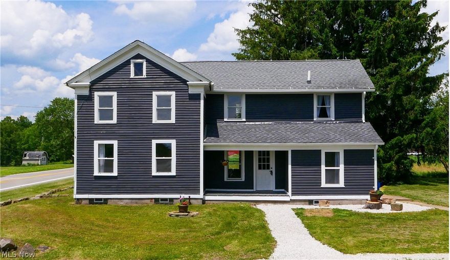 Come and see this beautifully renovated, restored 5 bedroom home. With a spacious updated kitchen that has new white cabinetry, new stainless steel appliances, live edge custom made countertops and an island overlooking the Livingroom. The Cozy Livingroom has a fireplace and wood floors leading out to the porch for summer nights. Two bedrooms and a full bathroom on the first story. The open staircase leads to three more bedrooms on the second story. The master bedroom is equipped with its own private bathroom, tucked away at the end of the hallway. Located on an over 2 acres this property has plenty of space for gardening, large yard, homesteading, etc. The large, detached 2 car garage has a new roof.  With minimal work the large barn could be used to board horses, house cows or whatever hobbies you have been wanting to take on. Schedule a showing and make this dream home yours today!