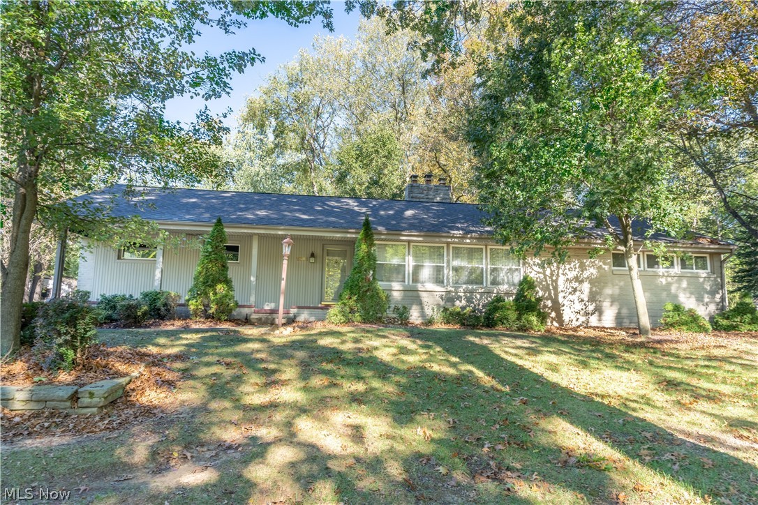 Three bedroom, 2 bath home in the Plain School District; nestled on a gorgeous wooded, acre lot. Spacious L Room with fireplace. Really nice kitchen with white cabinets, appliances (stove, refrigerator, microwave, dishwasher), Owner bedroom w/ceiling fan and cedar closet, and two other bedrooms. Third bedroom off the kitchen could also be used as the Dining Room. Bathroom on the main floor has vinyl flooring, walk-in shower, sink/commode, and first floor laundry facilities w/stackable washer/dryer. Lower level features carpeted recreation room w/newer track lighting, in addition to additional room that could be bedroom or office, closet; also full bath in the basement. Unfinished area of basement has glass block windows, newer electric box, workbench, and built in shelves. Both fireplaces and water softener are "as is." Deck in rear of house overlooking gorgeous, private yard. Shed. Updates: furnace (2015) and central air (2017), unsure age of windows, but are not original. Wonderful