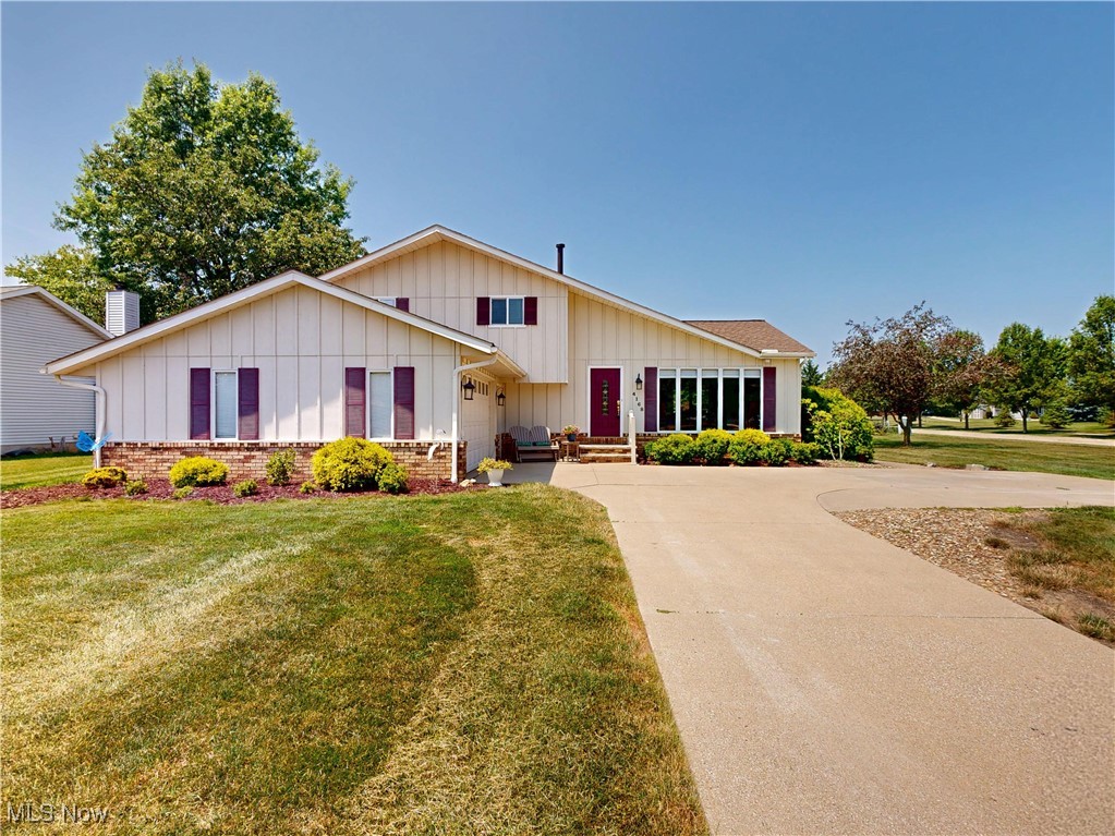 Welcome to this well-maintained and spacious 4 bedroom, 2 full bath multi-level home which is ideally situated on a desirable double corner lot. This property offers flexible living spaces including a finished basement, a lower level, main level, and an upstairs - plenty of space for your family and friends! The nicely equipped 2.5 car garage has a beautiful nature stone floor with plenty of storage. The driveway that has an additional concrete pad for extra outdoor parking or recreation. Enjoy the expansive multi-level deck with a connecting walkway and ramp, perfect for entertaining or relaxing. A newer eight person spa can be found located on the back deck with a metal canopy and mesh walls that offer a private and health focused backyard retreat. Inside, the home features numerous updates for comfort and efficiency. The mechanical systems include a newer high-efficiency gas furnace and central air, a high-efficiency air filtration system, IWave-R air cleaner, and Aprilaire 600 humidifier with auto controls. A newer roof (complete tear-off in 2020) can be found on the home, a 1 year old 50-gallon hot water tank, newer sliding glass doors, and updated windows. The kitchen is nicely equipped with newer stainless steel GE Profile refrigerator, a Café six-burner gas stove with double ovens and steam feature, a dishwasher and a Whirlpool microwave. The lower level features a newer Whirlpool washer and dryer with an Eco Washer that eliminates the need for expensive detergent. Additional highlights include a cozy gas fireplace, a walkout patio on the main and lower level, and the convenience of a school bus stop right at the corner. Your pups will stay safe and sound on your lot with an electric fence that completely surrounds the property. The neighborhood is friendly, welcoming, and the kind of place where neighbors feel like friends. Schedule your showing today to appreciate all this wonderful home has to offer.