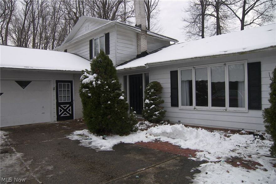 Desirable Hidden Hollow Subdivision! Big house seeking handy owners * 1st floor master bedroom w/large full bath and is handicap accessible * 2nd floor also has spacious master bedroom w/full bath & large closet * 1st floor laundry * Hardwood floors  * Vaulted ceilings * Cedar Closet *Gas fireplace * Updated electric panel * Huge concrete crawl area for storage * Large deck * On cul-de-sac * Good upside potential on this one! Needs new décor & various repairs * Sold "AS IS"  Original owner * limited lot-little backyard.