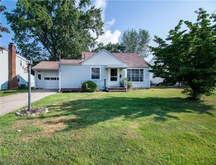 This charming bungalow in Plain LSD offers 2000 sq. ft. of bright living space.  Welcomed by the great room that features arched doorways, a built-in linen closet, and an abundance of natural light. The spacious dining room has newly installed laminate floors and cabinets galore. The charming kitchen has access to the covered breezeway which leads to the attached garage. The oversized master bedroom offers access to the deck and fenced-in backyard perfect for enjoying warm summer nights. A bright 2nd bedroom and a full bath featuring a walk-in shower complete the first floor. Upstairs offers a 3rd bedroom with multiple built-in dressers for ample storage. The full-sized basement features a finished recreation room with a convenient half bath. Make an appointment for your private showing today!