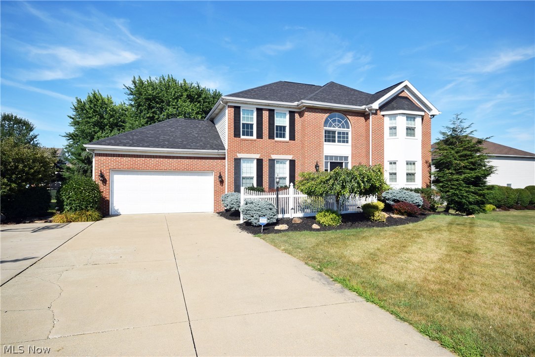 Stately brick front colonial in desirable Hyde Park Estates. New flooring, fresh paint, and new windows throughout! Open hardwood foyer. Dramatically-lit gleaming updated kitchen with breakfast bar which opens to a sunlight-filled dinette all new appliances. Open and airy great room with gorgeous fireplace. Private first floor office with hardwood flooring. Formal dining room with elegant wainscoting which opens to a light-infused pillared living room. Extensive wide moldings and dramatic inset soffit lighting throughout the main level. Elegantly grand master bedroom features a private master bath with over sized jetted soaking tub, double porcelain sinks, and a generous walk-in closet. Finished lower level boasts: a beautifully-inlaid bar (which is also plumbed for a refrigerator), rich oak built-in shelving and cabinetry, along with a gorgeous tiled bath. This spacious living area is perfect for entertaining, movie night, and/or a place to just kick up your feet and relax. An expansi