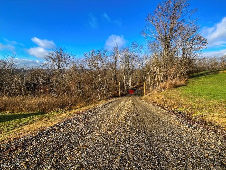 Escape to the outdoors with this 11-acre recreational property located in Pultney township in Belmont County, offering the perfect blend of privacy, usability, and natural beauty. A newly installed gravel driveway with gated access welcomes you onto the property, making it easy to enjoy right away while maintaining seclusion. The land features an established trail system ideal for ATV riding, hiking, or accessing hunting spots, along with a scenic creek that winds through the property and adds to the peaceful setting. Abundant deer sign throughout makes this a great option for the avid hunter or outdoor enthusiast looking for a private retreat. Whether you're dreaming of a weekend hunting camp, a rustic cabin, or a permanent homestead surrounded by nature, this property offers the flexibility to make it happen. As a bonus, a new Bad Boy tractor equipped with a loader and backhoe is also available for purchase with the property, making land maintenance and future improvements even easier. Quite, scenic, and full of potential, this is a rare opportunity to own a versatile piece of land that can be enjoyed now and built on later. Seller does not own mineral rights. Annual taxes are $496.30.