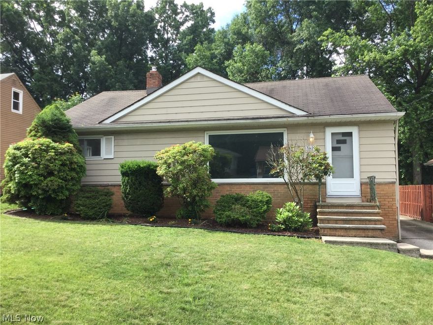 Welcome to this beautifully updated ranch. As you enter the front door you are greeted with a large open living room and dining room. Down the hall you will find 3 good sized bedrooms and 1 of the 2 full bathrooms. The original hardwood floors have been completely refinished and shine bright through out the home. The large eat-it kitchen not only has lots of counter top space, cabinet space and brand new appliances. It also has a sliding door built into the wall to help block out sound from the kitchen to living room.  Going through the kitchen and into the basement you will find the ultimate entertaining area with a full wet bar and pool table! The basement also has a full bathroom and laundry room area with storage. The furnace is newer, hot water tank 2011 and the electrical is a newer breaker box. The back yard has a large 2.5 car detached garage with and extra storage shed. This is a property you will not want to miss! Seller is offering a 1 year home warranty.