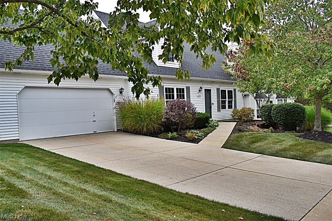 Welcome HOME to this immaculate and move in ready 3 bedroom, 2 full bath home in the heart of Twinsburg. Step into the 2 story vaulted Living Room w/gas fireplace which has open views of the Dining Room. Eat-in Kitchen with white cabinetry, breakfast bar, pantry and all appliances that will stay! Beautiful updated large screen-in sun room off of kitchen w/sliders for those cozy evenings with family and friends. A first floor bedroom w/walk-in closet and adjacent full bath offers first floor living if needed. A Laundry/utility room that leads to a 2 car garage w/service door to the rear yard complete this level. Large loft that could be used for an office, 2nd family room or for guests, overlooks the Living Room. 2 additional tandem bedrooms with a 2nd full bath complete the upper level. Just minutes from Twinsburg Square, shopping, dining and easy access to 480, RT 82 and 91. Updates include remodeled main floor bath in 2020, remodeled upper level bath in 2021, remodeled sun porch 2