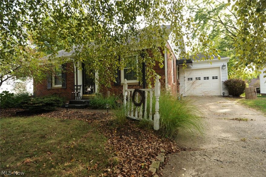 This Perry schools GEM  is an opportunity to have the type of home today's buyer is looking for!  The added addition allows a first floor family room in addition to your original living room lending to two lounging areas on the first floor, plus a very spacious Master Suite bringing the home to over 1,700 square feet.  The bright kitchen opens to the family room with a great window view to your large privately tree lined rear yard.  Hardwood floors plus the paint and décor that is so desired...just picture perfect plus a floor plan for easy living.  Two first floor bedrooms and plus Master bedroom with double closets. Nice second floor option room great for your own master lounging area or office.  Newer windows, updated electric and furnace. Very charming in and out!!  Located near Perry Park with easy access to schools and shopping!!!