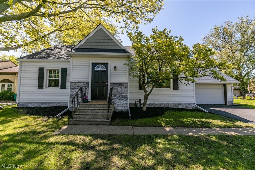 Welcome to this stunning bungalow  that is move-in ready! Step inside to this splendid living room, with an impressive accent wall, and huge window to let the natural light shine into the room. Across the hall is the phenomenal dining room, with an archway door that overlooks the kitchen and a beautiful glass door to open up to the backyard. Do not miss the amazing kitchen with all new gray and white cabinets that accent the granite countertops and subway tile. The stainless steel appliance ties the whole kitchen together! Four nicely sized bedrooms and all updated bathrooms! New carpet and flooring throughout. Fresh paint and new furnace.