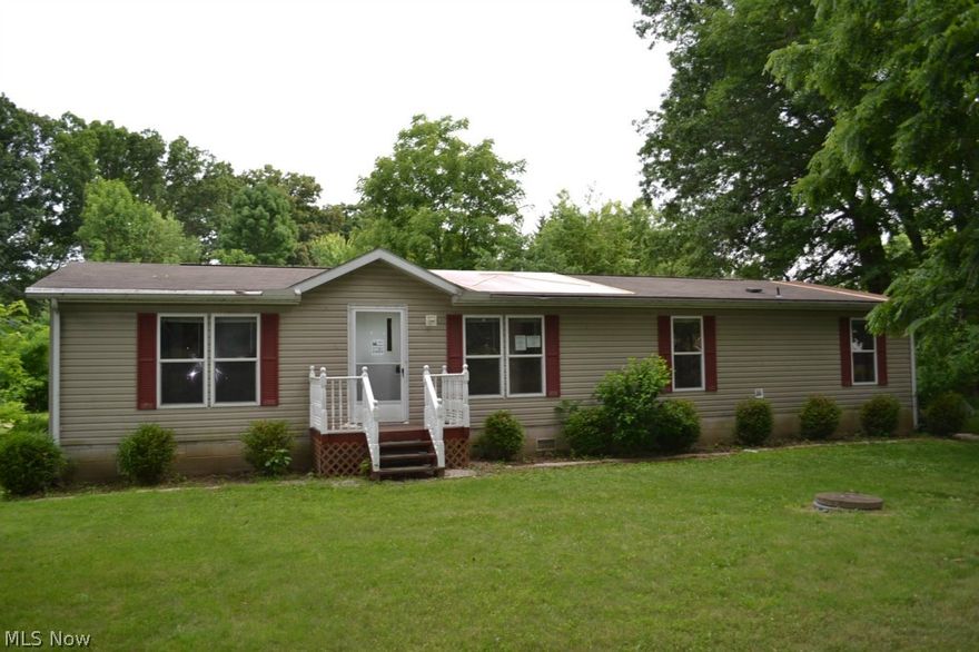 Located right next to Turkeyfoot Lake, this lovely ranch-style home has a lot of great features, including a large yard, a very large two-car
garage, and a back deck! Inside, you'll find spacious rooms, flooded with natural light, two bathrooms, a jacuzzi tub, and more! You won't want
to miss out on this one!