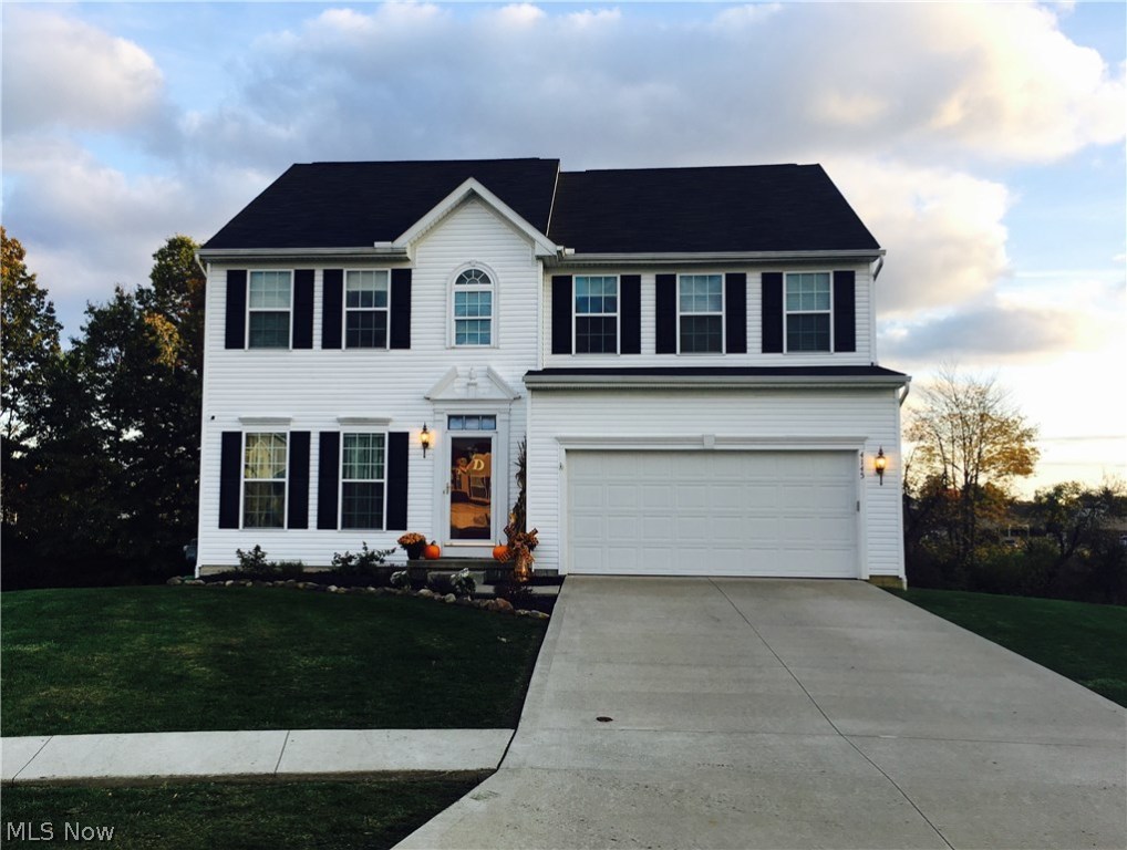 BEAUTIFUL & UPGRADED home on cul-de-sac in one of Brimfield's most prominent areas of Sterling Green!! YOUR dream home is highlighted by 3000 square feet of finished living space, a gorgeous kitchen with stainless appliances and a large island bar connected to a vaulted sunroom. The first floor boasts a spacious OPEN FLOOR PLAN with wood flooring, that is perfect for entertaining! Upstairs features 4 large bedrooms and the master suite even includes a huge walk-in closet! The fully finished basement comes with lots of livable space, a room already fit for installing a bathroom and loads of storage space. YOUR NEW HOME comes with exquisite curb appeal, a large back deck for grilling and entertaining as well as the house backing up to a field area with no one living behind you! Other AWESOME upgrades include: security system, extra windows installed for lots of light, whirlpool master bath, 10 year transferable warranty and many others! Priced to sell in a lively development, this one wi