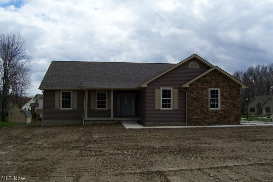 New construction split Ranch just completed by 'Homes by Lynn Dieter' now available in beautiful Heron's Landing. Front door w/etched glass and sidelights, stone treated side entry garage, upgraded vinyl siding and dimensional shingles.  Wide open plan features striking oversized ceramic tile in foyer, kitchen & dining, laundry and both baths. Gas fireplace w/painted mantel and stone trim and hearth, warm maple cabinets in kitchen and baths with oil rubbed bronze cabinet hardware, light fixtures & ceiling fan.  Stainless steel appliances include dishwasher, gas range and microwave.  Open staircase in great room leads to huge 12 course basement and high efficiency furnace.  Central air.  Laundry room off foyer is spacious and includes closet and hanging rack. Deck conveniently located off great room. Deep corner lot. Heron's Landing Clubhouse with workout facilities, meeting/social room and outdoor pool is just around the corner.