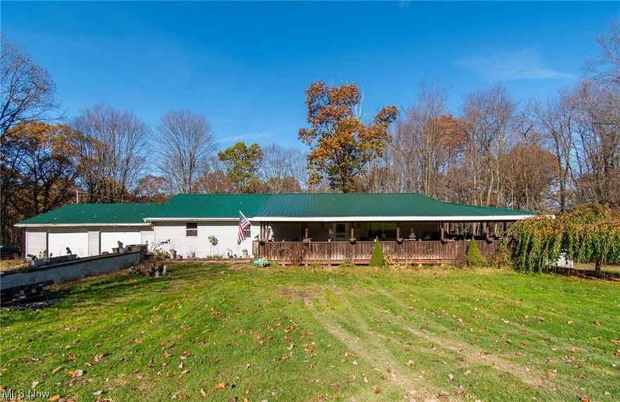 Welcome to over 5.5 acres of country living! This 3 bedroom, 2 full bath, ranch style home has so much to offer. The eat-in kitchen is open to the great room. The over-sized laundry room is conveniently located by the bedrooms. New water heater and some new vinyl plank floors. There is a 2 car attached garage and a huge detached garage behind the house. This home has an above ground pool off the wrap around porch where you can sit and enjoy the many deciduous trees and a harvest from fruit trees. Well and Septic testing has been performed by County Health Department and passed. This property even has a separate manufactured home with public water, and separate electric for a possible rental. Call for your tour of this private haven with the elbow room you need.
