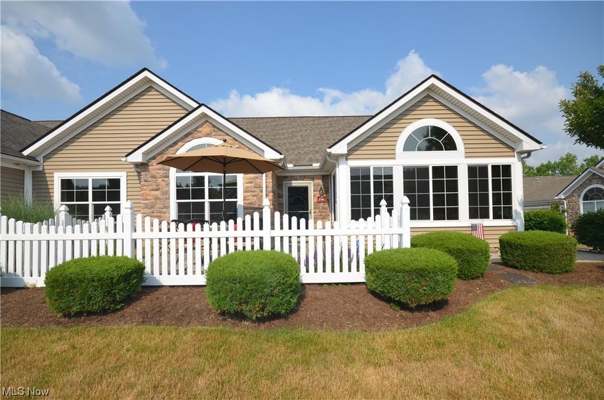 Former model- largest ranch layout, Canterbury Model, with all of the updgrades in a prime location right across from the Clubhouse & Pool! Move in condition condo with cathedral ceilings, open layout, 4-Season Cathedral Sun rm, Cathedral Office w Laminate flooring- all located close to the wonderful downtown Kent, Kent State University w new development, parks & shopping. Enjoy outdoor space w your 186 sq ft patio w vinyl fence & added flowers/landscape. Great room w gas fireplace operated by a switch, ceiling fan w dimmers to control light/fan. Double wide entry to the sun room to provide great daylight in the condo & a gorgeous additional living space. Dining area open to the gourmet kitchen w breakfast bar- Granite Counters, Glass Subway Tile Backsplash, Laminate Floor, Added Buffet w Cabinets & Counter, Tube Skylight for additional Daylight, GE Stainless Steel Appliances & Lg Pantry Closet. 1st Flr Laundry w Utiility Sink, Cabinets & 7x7 Storage rm fully finished. Cathedral Office