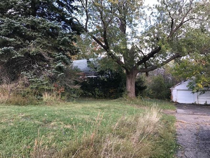 Outstanding opportunity for potential commercial development.   Home and lot being marketed as-is.   Buyer to obtain all information and permissions for any commercial use from city and county.  Seller does not guarantee property use.  Home on property is in need of substantial repair and work.  Call Broker for details