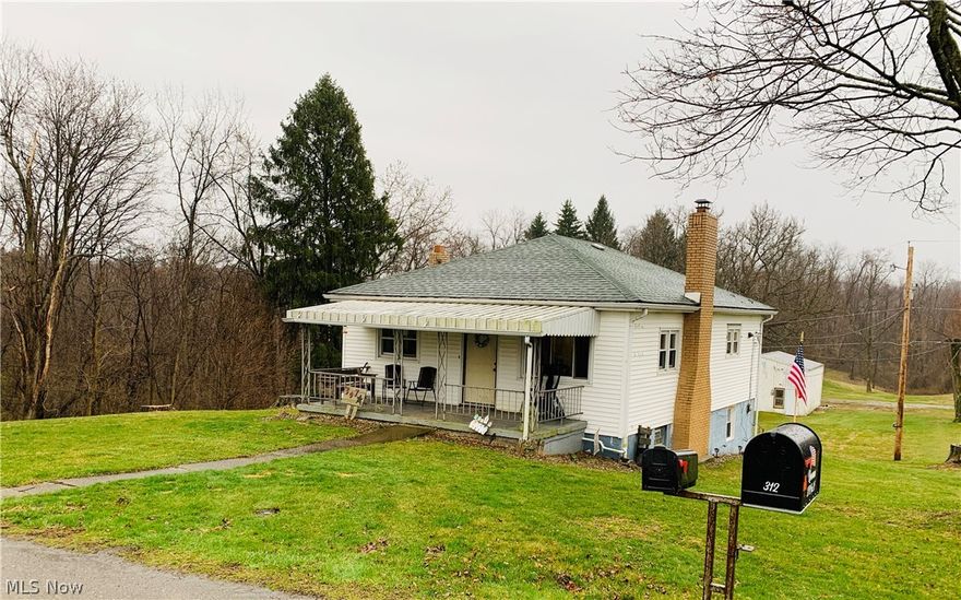 Beautiful updated home on almost one acre of land on the countryside of Toronto. This home features a new kitchen, new laminate flooring, fresh paint, vinyl windows, a finished basement with bar, and a large 24x32 detached garage for storing things such as boats.