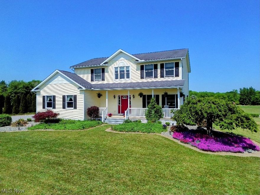 Immaculately kept by its original owner, this custom-built home using 2X6 construction is situated on 7 acres.  Upon entering the front door you will find a 2-story open foyer with a custom hard wood banister and railing.    
The kitchen offers ample cabinet and counterspace and is open to the dining area with a sliding glass door that leads to a spacious deck where you can enjoy your private backyard.  The main floor also boasts a convenient laundry room off the kitchen with a utility sink. Hidden behind a pocket door is a charming half bath off the entry hallway. 
With the abundance of natural light coming in through windows, and 9-foot ceilings, the first floor is bright and airy. 
On the 2nd floor, the primary suite is large and boasts 2 closets, including a walk-in.  The primary bedroom has an ensuite full bathroom.   The two guest bedrooms are oversized and boast plentiful natural light.
Never worry about a power outage with your 14KW whole house Generac generator with automa