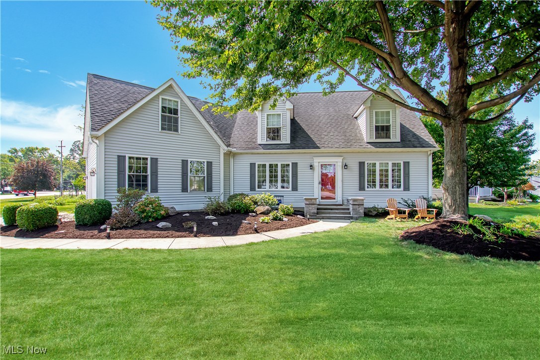 Welcome to your dream home located on serene Lake Road in a highly sought-after neighborhood of Avon Lake, Ohio! This spacious Cape Cod boasts an abundance of natural light, views of Lake Erie, fantastic location near parks, with beautiful bamboo floors that flow seamlessly throughout the main living areas. Step inside to discover the inviting vaulted ceilings in the luxurious owner's suite, offering a perfect retreat at the end of the day. The versatile fourth bedroom provides excellent options for use as a primary bedroom, guest room, or home office to suit your lifestyle needs. The thoughtfully designed second-floor laundry area enhances convenience, allowing for a sleek new mudroom off the garage—ideal for keeping your space tidy and organized. As you move through the kitchen you will notice it has upgraded appliances that will make preparing meals a breeze! Recent updates ensure peace of mind, including a new A/C system installed in 2024 and professionally trimmed trees to maintain the stunning surroundings. You’ll love the fresh new landscaping that has been completed just in time for the market, enhancing the curb appeal of this charming home. Bright, contemporary light fixtures have been installed throughout, adding a modern touch to each room. Don’t miss your chance to own this beautiful gem in Avon Lake—an exceptional home that expertly blends comfort, style, and convenience. The home is conveniently located across the street from Avon Lake Boat Launch, the fishing pier, a park and playgrounds. Schedule your private showing today!