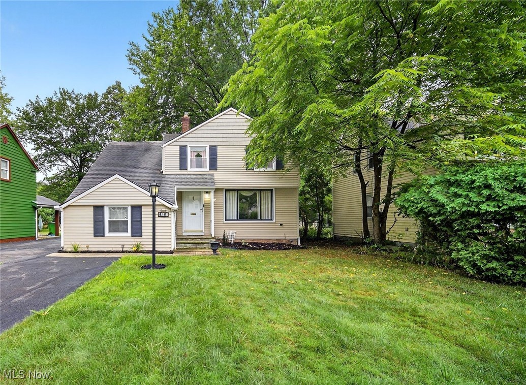 Welcome to a beautifully maintained three-bedroom, two-bath Colonial located in the heart of Warrensville Heights. This home has been cared for & well maintained for many many years. Enter through the spacious living room with attached dining room offering natural light, hardwood floors & updated light fixture. The functional kitchen with breakfast bar provides, essential cabinet space for everyday needs, microwave, dishwasher & attached 1/2 bath. Just a few steps down from the kitchen is a cozy sunken family room with beautiful built in shelves, closet space & exterior access to the rear of home. The family room is great for relaxing or entertaining. Hardwood floors continue upstairs with three comfortable bedrooms with ceiling fans, ample closet space & full bath. The partially finished basement/recreation room has additional living space with an updated furnace, hot-water tank, bar, separate laundry area, washer & dryer included. The exterior is clean & manicured with an extra long driveway, partially covered rear patio & large two-car garage with storage. A semi-private backyard offers a peaceful retreat for relaxing. This home has
so much to offer, don't miss the opportunity to make it yours!
