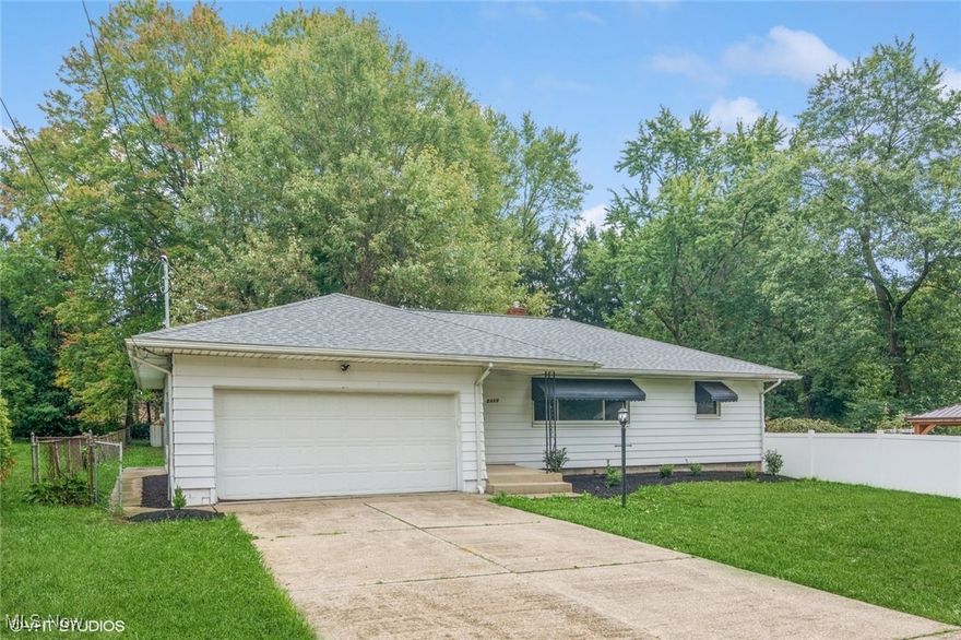 Great rural feel to this large city lot!  Nicely remodeled 3 BR Ranch, with new Shaker Style White Kitchen, Granite counter tops, and Stainless Steel appliances!  Updated Bathroom too!  Fresh neutral paint and New LVP Vinyl Flooring throughout!  Newer Roof, Furnace, Central Air, and Hot water tank.  Updated Electrical.  2 Car Attached Garage.  Fenced yard!  Basement is ready for you to finish! Spacious rooms and a small enclosed side/ back porch area and patio.  This is a Fannie Mae HomePath Property.