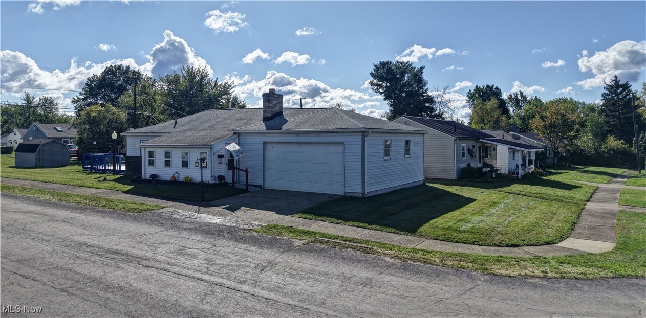 Welcome to this cozy one-story Ranch home located in Northeast Canton, offering both potential and charm in a modest footprint. Great opportunity for investors or first-time homeowner. Main entrance leads to mud room/three seasons and into the living room which offers a working fireplace. Beautiful doors lead from master suite to back deck which has been recently updated and newly painted perfect place for a hot tub, etc. Eat in kitchen has plenty of cabinets for storage. Three bedrooms, one full bathroom, and six-year-old hardwood floors throughout with moisture barrier installed. Two Car attached garage with built in shelves and an exit door to the side yard. Under crawl spaces were just inspected and cleaned and sealed with moisture barrier. Two storages sheds with electric. Extra lot extends to corner, large flat yard come with the home.
Extra lot provides extra flat corner yard.