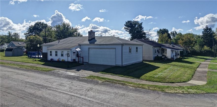Welcome to this cozy one-story Ranch home located in Northeast Canton, offering both potential and charm in a modest footprint. Great opportunity for investors or first-time homeowner. Main entrance leads to mud room/three seasons and into the living room which offers a working fireplace. Beautiful doors lead from master suite to back deck which has been recently updated and newly painted perfect place for a hot tub, etc. Eat in kitchen has plenty of cabinets for storage. Three bedrooms, one full bathroom, and six-year-old hardwood floors throughout with moisture barrier installed. Two Car attached garage with built in shelves and an exit door to the side yard. Under crawl spaces were just inspected and cleaned and sealed with moisture barrier. Two storages sheds with electric. Extra lot extends to corner, large flat yard come with the home.



Extra lot provides extra flat corner yard.