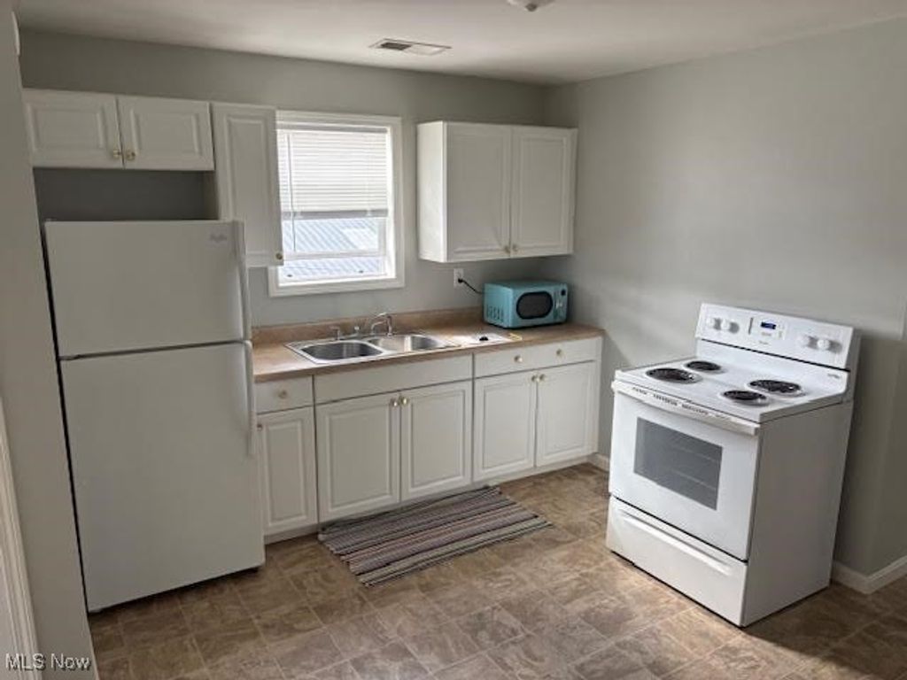 Photo of 332 2nd Street NE, New Philadelphia, OH 44663 (MLS # 5164190)