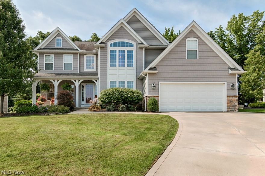 Stately Colonial on the cul-de-sac offers up a dramatic floor plan with a two story foyer and a great room with high ceilings, a fireplace and a wall of windows! Gathering spaces include a sprawling kitchen with island and stainless appliances, morning room and breakfast bar. For more formal gatherings adjourn to the large dining room. A comfy sitting area offers up additional entertaining space. Oversized mud room and first floor laundry a plus! Looking for a master suite retreat? Note the size of the master bedroom with glamour bath and walk-in closet. Other bedrooms offer abundant spaces, closet storage and share another full bath. The lower level is finished with a large recreation area and a potential teen suite with private full bath. There is also an unfinished portion of the basement that is ideal for storage. The backyard offers a large patio and is great for entertaining. Surround sound system on all 3 levels of home and patio. Updates in 2012 include: new landscaping (all be