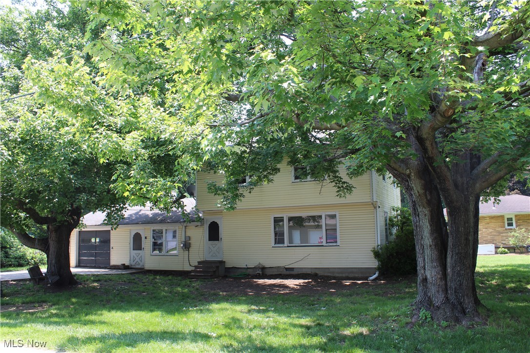 Broker Remarks: Opportunity knocks at this corner lot!! This 3 bed, 1.5 bath home, is located in a quiet neighborhood in Buckeye school district. The large living room has been freshly painted and even comes with an electric fireplace. The retro, eat-in kitchen, has a functional layout and the natural wood cabinets make the room warm and inviting. The laundry room is very spacious and even has original built in cabinets. Just off of the laundry room is a bonus room that would make a great family room, office or extra sitting room. The half bath is located just off of the 1 car garage and has just had some plumbing repaired. All 3 bedrooms are located on the second floor, along with the full bathroom. Whether you're purchasing your first home or investing in real estate, with over 1,800 square feet of living space, this house has plenty of options.
