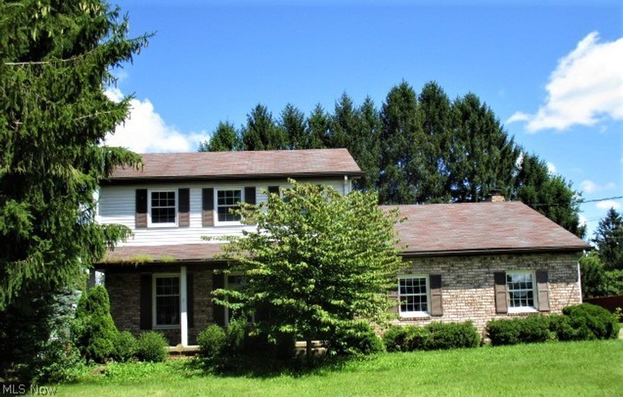 Charming brick front colonial featuring 3 bedrooms, 2.5 baths, large all season room with sliding doors leading to L shaped deck and pool, family rm. with fireplace, finished basement with full bath and spacious 2 story outbuilding. Call Today...