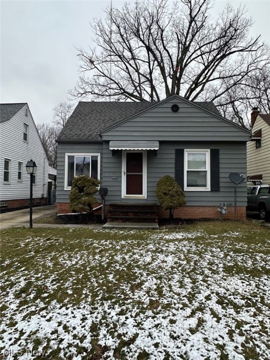 A charming bungalow boasting 1212 square feet and two bedrooms on the main floor. The kitchen offers a cozy eat-in area while a formal living room provides ample space for relaxation. Hardwood floors grace most of the first floor, adding to the home's appeal. An additional bedroom resides on the second floor. The partially finished basement, complete with a full bath, offers extra square footage and storage options. Outside, a detached garage includes an attached patio area, perfect for outdoor gatherings. The fenced yard ensures privacy and security. Conveniently located near shopping centers and medical facilities, this home offers both comfort and convenience.