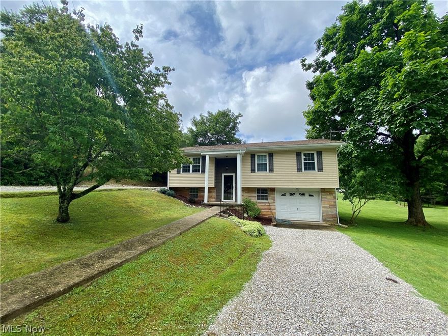 Green Acres is the place to be! This 2 acres gives you plenty of room to garden or play. The first floor has been updated with a new kitchen and bath. This split level actually offers 1st floor living. The home features, a living room, dining room, kitchen, 2 bedrooms, and a bath/laundry. The lower level is currently being used for storage but it is a family room. There is a one stall garage and multiple out buildings for storage. This is a must see property! Call today!!