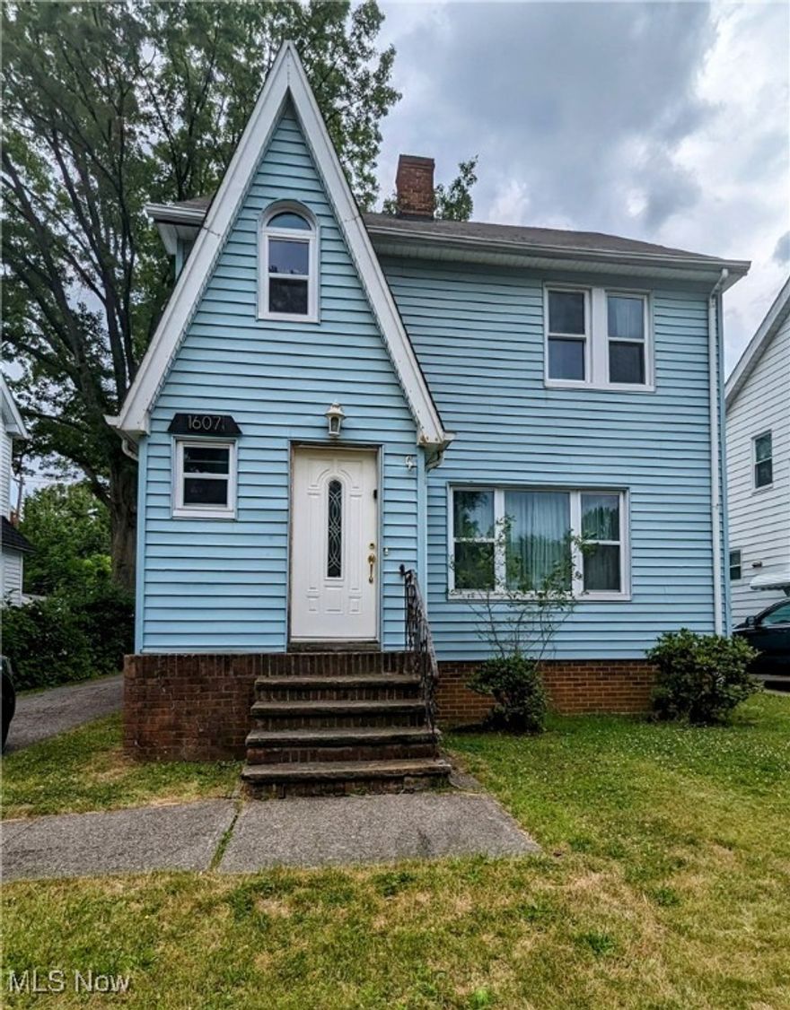 Excellent Cleveland Heights location! One and a half blocks from Mayfield Road and close to everything! LARGE 1872 square foot
colonial!  The first floor family room addition also features a half bath for convenience!  Vinyl siding for minimal maintenance!  Updated windows!  Four bedrooms with generous closet space!  Very nice living room features hardwoods and a fireplace! Oak cabinetry in the kitchen! Two staircases to access the upper level!  Third floor attic for extra storage!  Unfinished basement with a tankless hot water supply!  Updated electrical panel!  Good size 2-car garage!  Nice yard!