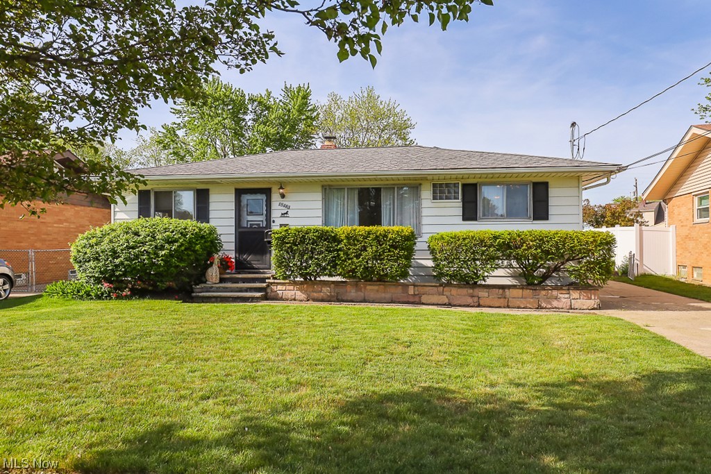 Welcome home to this lovely well maintained, one owner ranch home, popular for it's single level living, offering convenience and easy accessibility. This home boasts 3 bedrooms that provides flexibility for your family or individuals needing extra space for an office, guest room or hobbies. The full bath serves as a functional and comfortable space for personal care and relaxation. Beautiful hardwood floors throughout including the family room/dining area with newer carpet. Basement includes rec room, workshop with plenty of storage and laundry room. With a fully fenced in yard, you have a private and secure outdoor space for various activities such as gardening, entertaining guests under the covered porch, or simply enjoy some fresh air. The 2 car garage provides ample parking and additional storage space. Living in one of the finest and desirable areas means you'll likely enjoy a safe and welcoming neighborhood in the Berea CSD. Living in Brookpark offers several benefits, providing