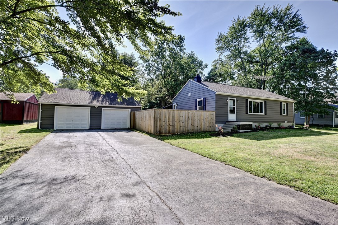 Welcome home to this gorgeous, totally redone three-bedroom, two full bath ranch. Beautiful, refinished wood floors, new trim, freshly painted, and new lights throughout. Stunning, large kitchen with new soft close cabinets, Quartz countertops, backsplash, extra deep farm sink, new smart gas range, built in microwave, new stainless steel Samsung fridge, dishwasher, floating shelves and fixed seating area. Full bathroom has a barn door and has been totally redone with new tile, Granite counters, vanity, sink, mirror, light, toilet and walk in shower. The lower level offers a full unfinished walk out basement with new wash sink, tankless water heater, and has a full bath. So much room for storage or to be finished. The fabulous large partially fenced in backyard has a covered patio, above ground pool, shed, and large barn. There is a 2.5 car garage with plenty of power and 220V hookup. New roof, exterior has been recently painted, replaced A/C-new thermostat, replacement windows. Nothing to do but move right in!