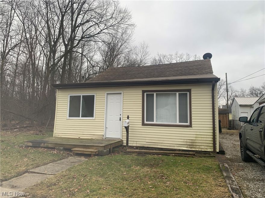 Great investment opportunity or first home buyer. Not many homes under $100K / Updates include : Newer furnace, new flooring including laminate,vinyl, and carpeting thru out. New electrical fixtures and ceiling fans, new paint, newer hot water heater, new front window, new roof on front section of home. Updated bath with new tub surround, vanity, and recaulked tiles, 10x10 shed, private setting at end dead end street, fenced in yard. Large dormer up with 2 bedrooms down plus first floor laundry and enclosed front entry. This can make the perfect starter or rent is in high demand for single family homes.