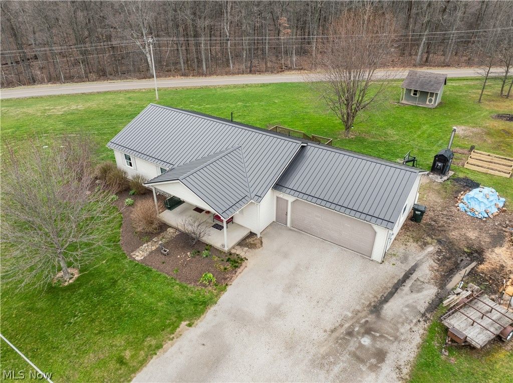 Photo of 8721 Camp Road NW, Dundee, OH 44624 (MLS # 5200259)
