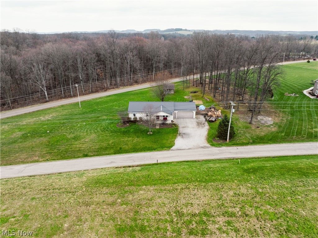 Photo of 8721 Camp Road NW, Dundee, OH 44624 (MLS # 5200259)