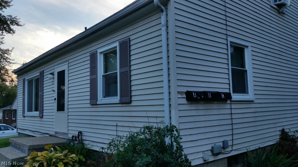 Calling all Investors! Here is your opportunity to own a GREAT Investment property that has 3 YES, THREE, rental units in the City of Kent that is a 3 unit with the County! Large parcel for plenty of parking, partially fenced, in very good shape! Ready to sell so owner can officially retire! Homeowners that want an investment....this also is for you, live in one unit and rent the other two so you live for free! Many updates in the past 5 years include brand new limestone drive 9/2014, Kitchen and Bath in Basement Level unit 2011, new ROOF in 2009, new water heaters 2009, windows replaced 2008 (16), entire 1st floor unit remodeled including floors, walls & doors, other updates include public sewer, gas meter, studio porch, among others. Great rental history. Utilities are not separated.