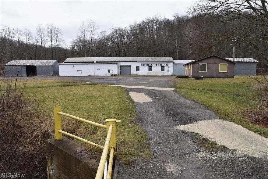 8.7 ACRES, 26X150 MAIN BUILDING WITH 3-PHASE ELECTRIC, 5 TON BRIDGE CRANE, 40X60 STORAGE BUILDING. OFFICE BUILDING. ELECTRIC HEAT AND RESTROOMS. 1,400 FT BORDERS OHIO RAIL CORP. BROKER OWNED. Mineral rights do not transfer with the property.