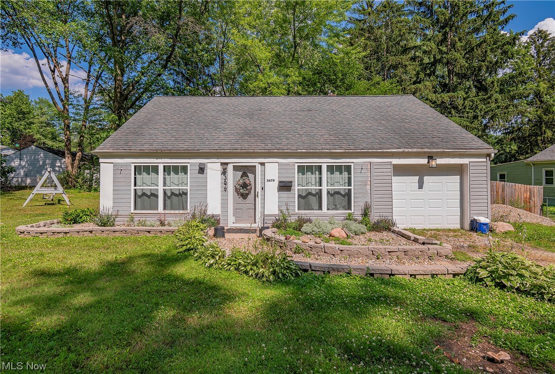 Welcome to 3679 Sanford Avenue! Sitting on a beautiful .4 acre corner lot, this cape cod boasts 3 bedrooms and 1.5 bathrooms. Enter into a large enclosed front porch where you will love drinking your morning coffee. Your kitchen comes complete with 2021 stainless steel appliances. Don't miss the conveniently located first floor laundry and first floor bedroom! The laundry/mud room sits right off the kitchen giving access to the back patio and fenced in backyard area.
You will find the two remaining bedrooms and half bath on the upper level along with plenty of closet space and built-ins. Enjoy your lovely treed side yard complete with a shed and bonfire area, perfect for entertaining! Washer/dryer 2019. Schedule your private viewing today!