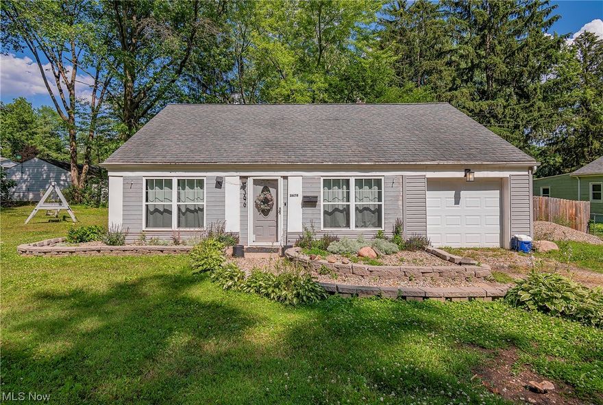 Welcome to 3679 Sanford Avenue! Sitting on a beautiful .4 acre corner lot, this cape cod boasts 3 bedrooms and 1.5 bathrooms. Enter into a large enclosed front porch where you will love drinking your morning coffee. Your kitchen comes complete with 2021 stainless steel appliances. Don't miss the conveniently located first floor laundry and first floor bedroom! The laundry/mud room sits right off the kitchen giving access to the back patio and fenced in backyard area.
You will find the two remaining bedrooms and half bath on the upper level along with plenty of closet space and built-ins. Enjoy your lovely treed side yard complete with a shed and bonfire area, perfect for entertaining! Washer/dryer 2019. Schedule your private viewing today!