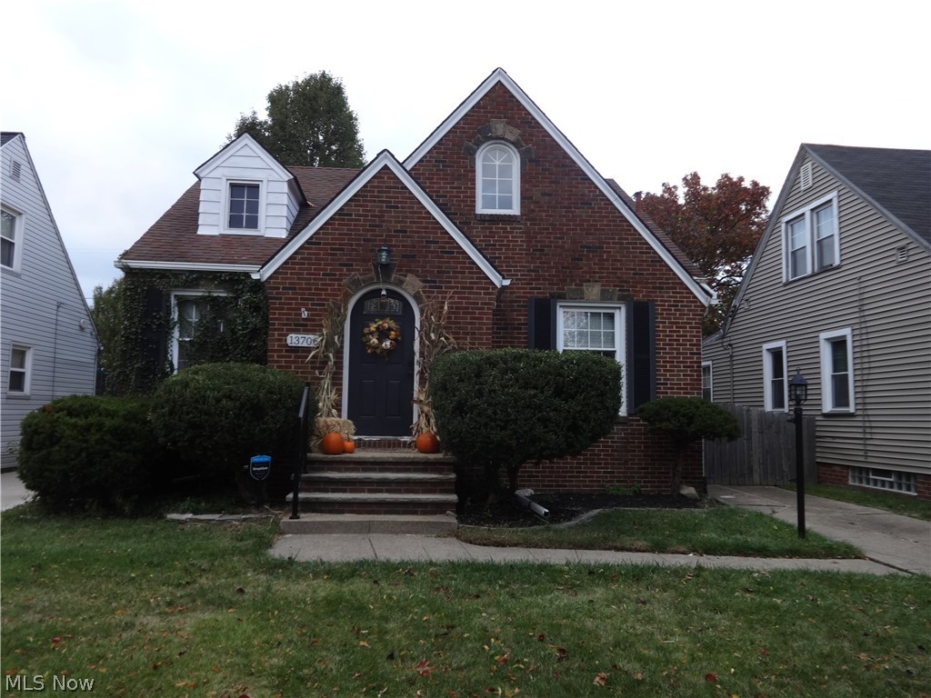 Large 3 bedroom brick cape cod in Cleveland's West Park neighborhood. This house if filled with style and class. Open floor plan, spacious living and dining rooms, with beautiful flooring throughout. 2 large bedrooms, 1 full bath and a recently remodeled space saving kitchen complete the main floor. Huge master suite with half bath upstairs allows for endless options. Downstairs is a full unfinished basement that provides for tons of storage space and also makes a great home gym, play & entertainment room. Out back you will find a private patio & 2 car detached garage with fenced in back yard.
