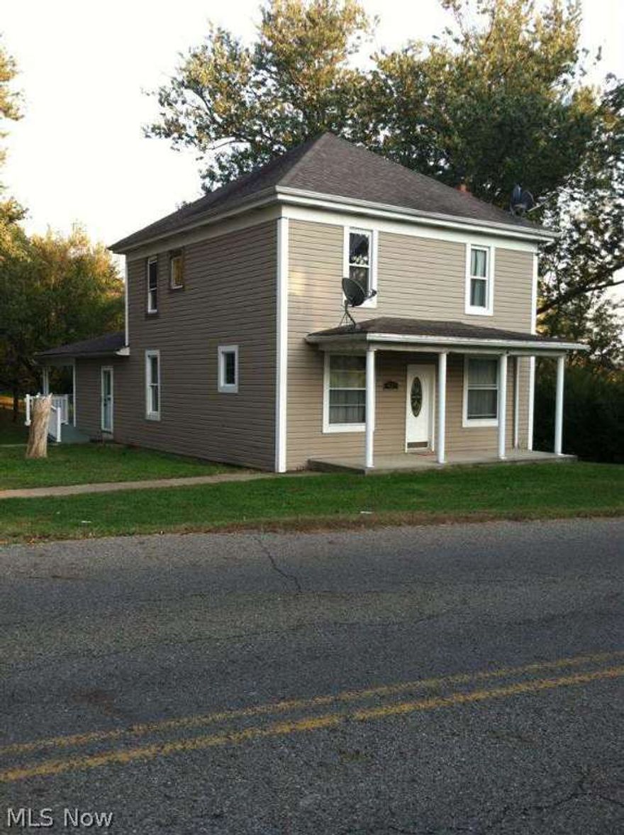 This three bedroom house has a nice view from the covered deck off kitchen. There is a possible 4th bedroom or office space located on the main level.  There has been many improvements made to the house.  A beautiful new kitchen with vaulted ceilings, new electrical wiring, new water tank, new carpeting, some new plaster and drywall.